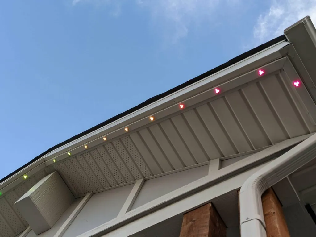 Colour-changing permanent soffit lights lit during the day